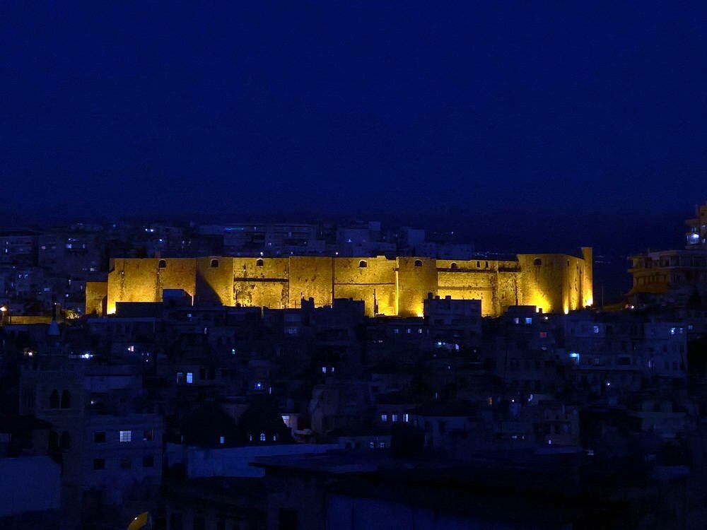 Night view of the western facade of the Tripoli Citadel.