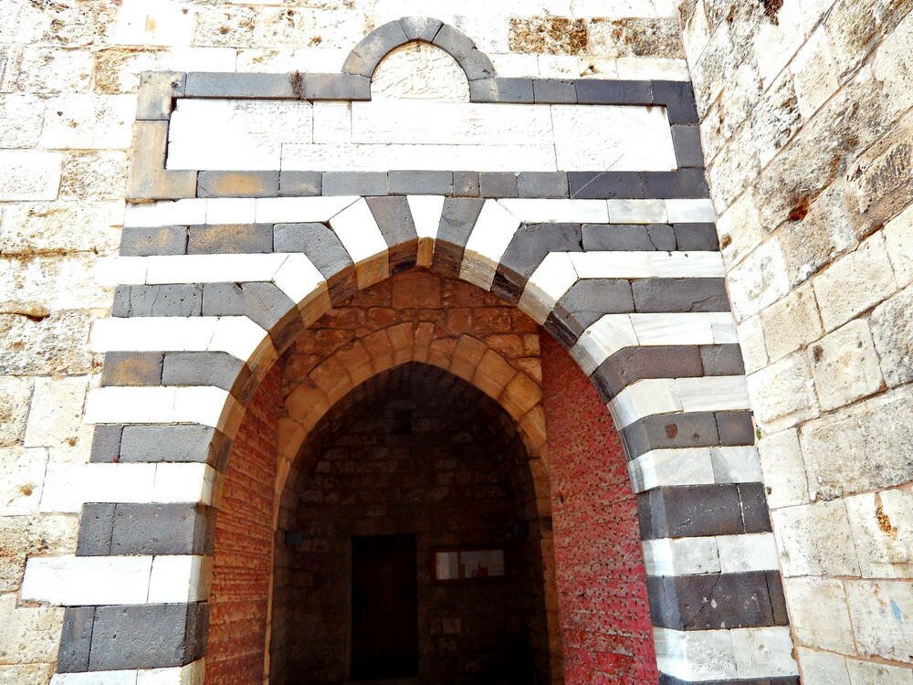 The main portal of the Tripoli Citadel. Above is the tablet commemorating its construction during the reign of the Ottoman Sultan Suleyman the Magnificant.