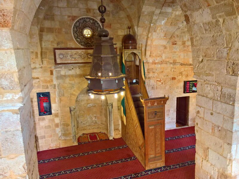 The minbar and central mihrab of the Mansouri Great Mosque.