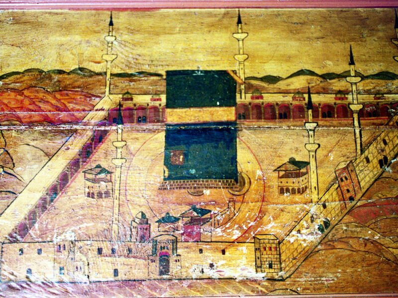 An old painting of Mecca placed above the door of the minbar of the Mansouri Great Mosque.